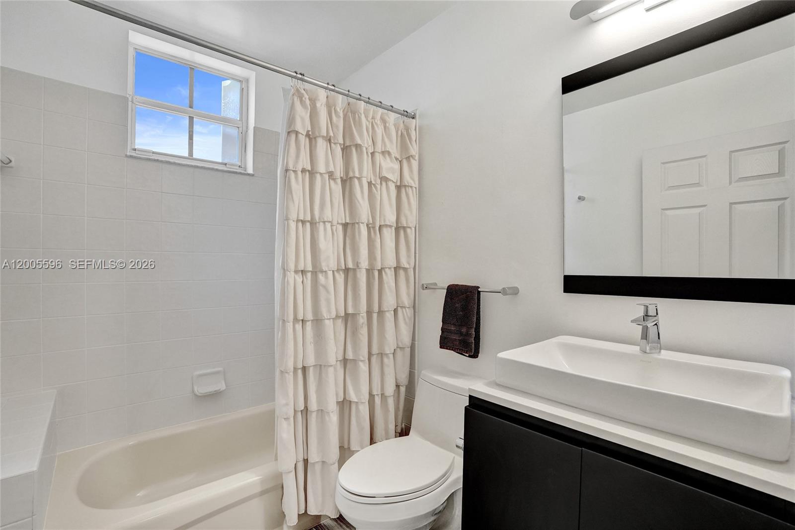 4281 Laurel Ridge Circle Weston, FL 33331 - Photo 36 of 80 a bathroom with a sink a toilet and shower