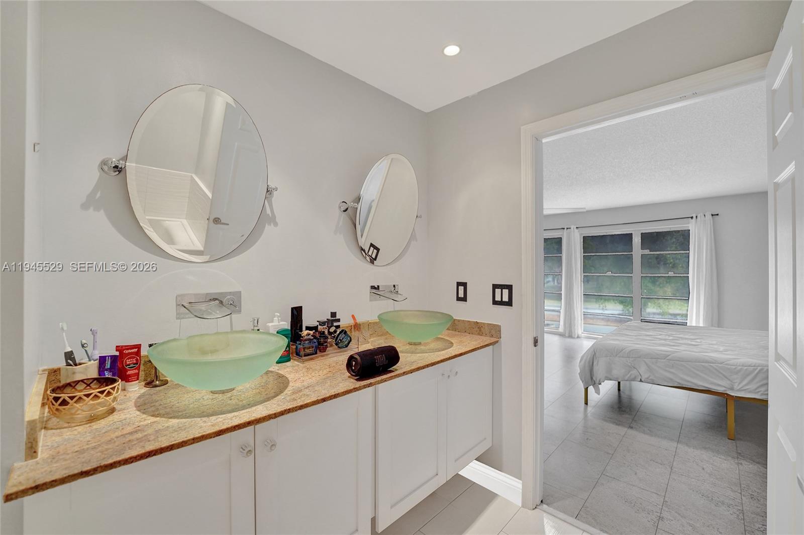 3301 Raleigh Street, Unit 4E Hollywood, FL 33021 - Photo 69 of 80 a bathroom with a sink and a bathtub