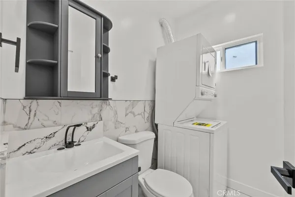 a bathroom with a sink and a toilet