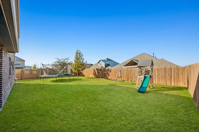 a view of a park with a slide