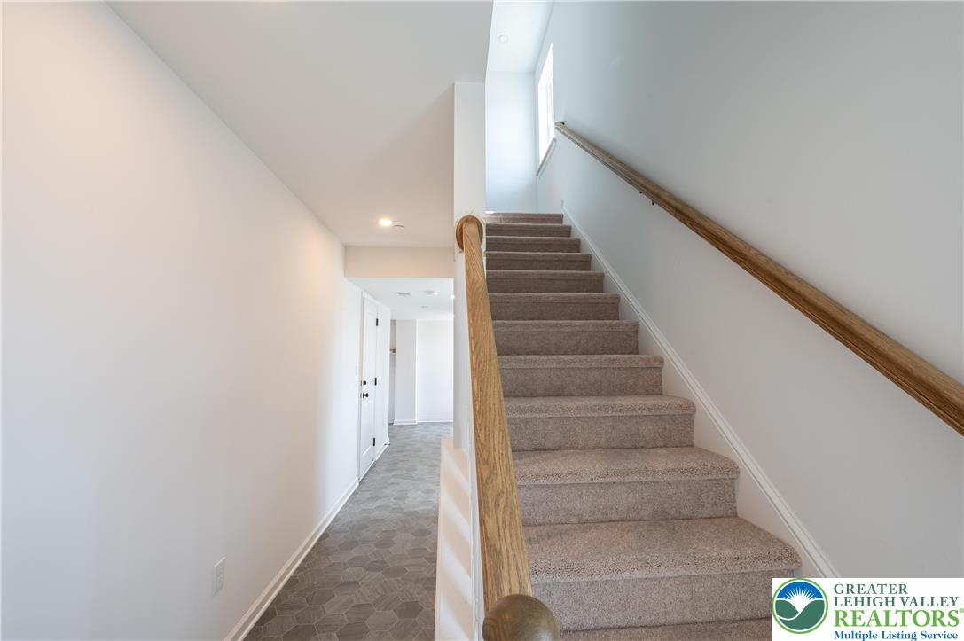 560 Long Street, Unit 4 Emmaus, PA 18049 - Photo 14 of 16 a view of staircase with white walls
