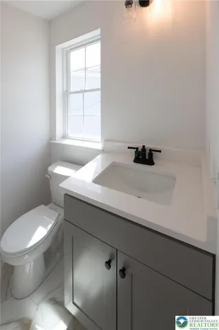 a bathroom with a sink and a toilet