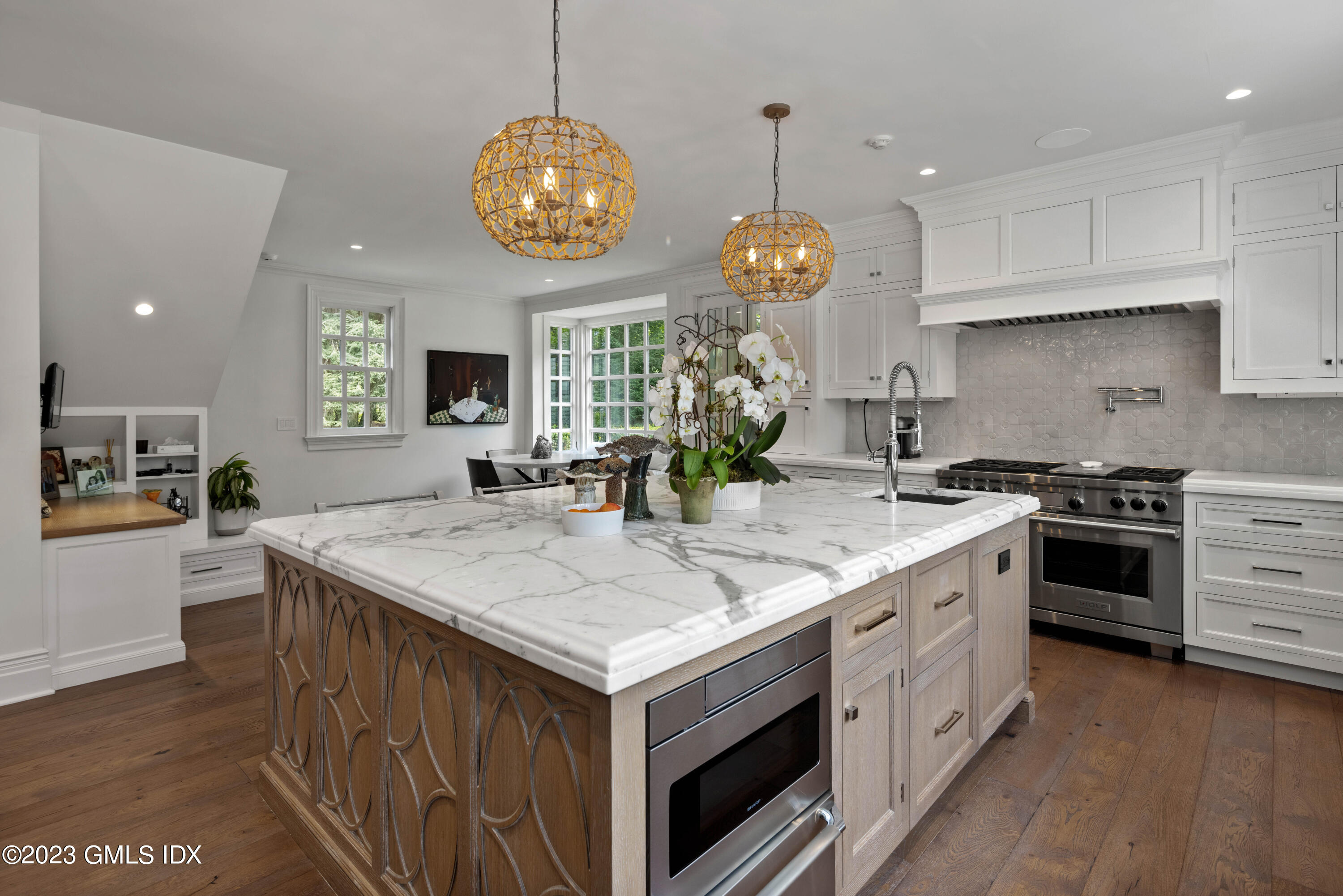 80 Round Hill Road Greenwich, CT 06831 - Photo 19 of 57 a kitchen with a sink and a stove top oven