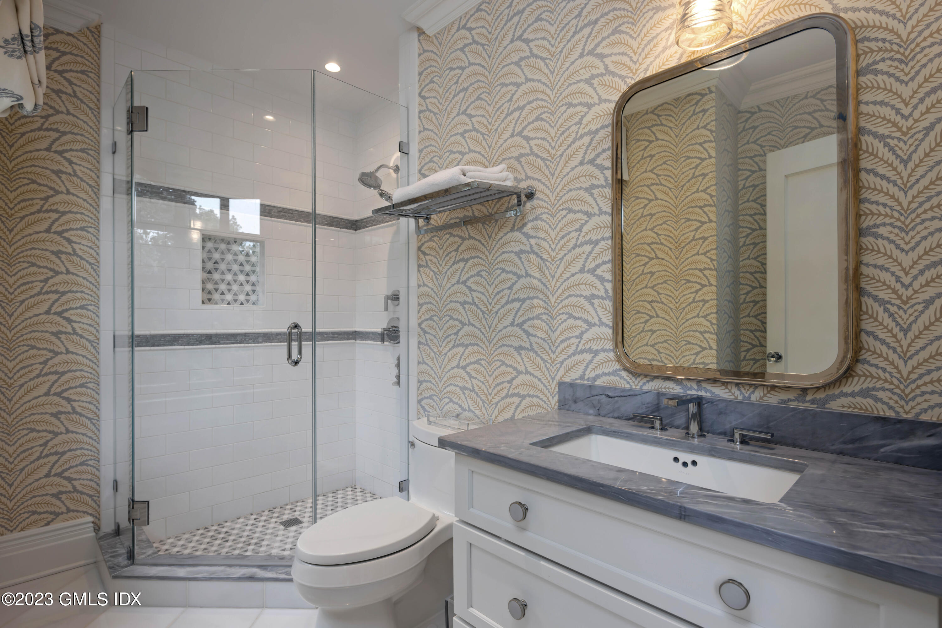 80 Round Hill Road Greenwich, CT 06831 - Photo 36 of 57 a bathroom with a granite countertop sink toilet and shower