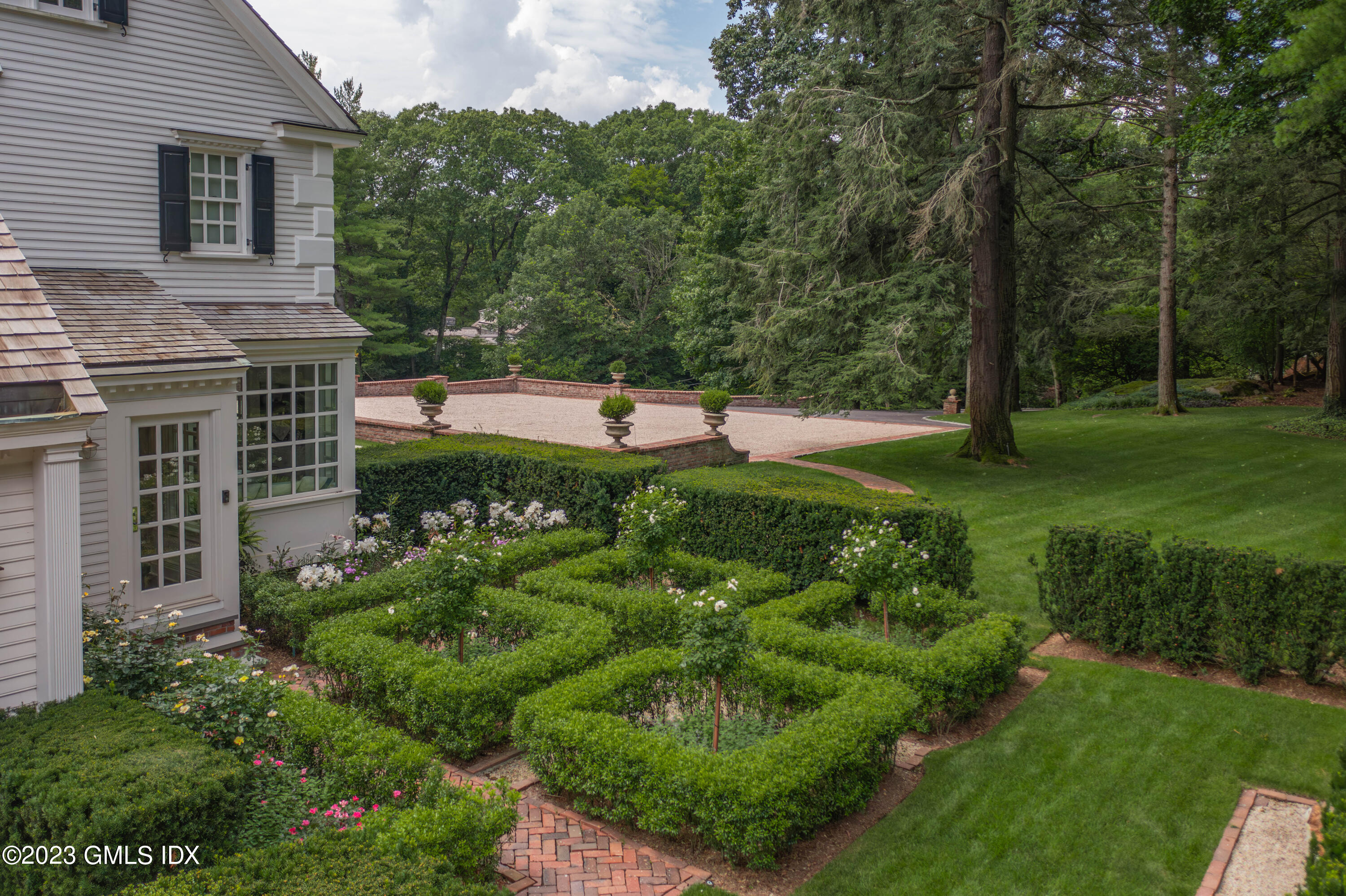 80 Round Hill Road Greenwich, CT 06831 - Photo 48 of 57 a view of backyard with green space
