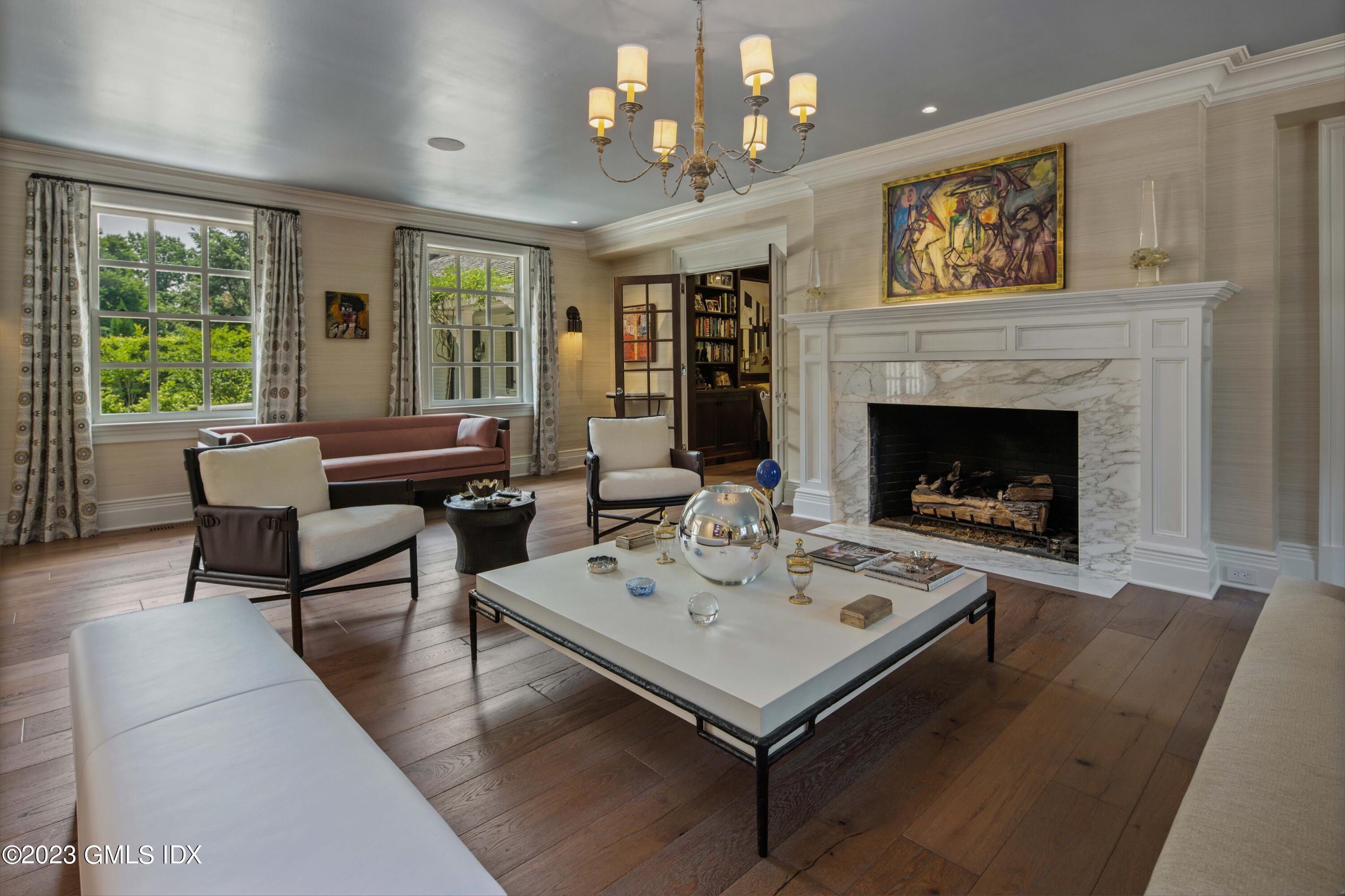 80 Round Hill Road Greenwich, CT 06831 - Photo 5 of 57 a living room with furniture and a fireplace