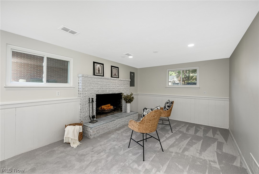 426 Sandhurst Road Akron, OH 44333 - Photo 10 of 32 walk-out level with additional family room w/ fireplace