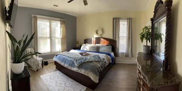 a bathroom with a sink toilet and window