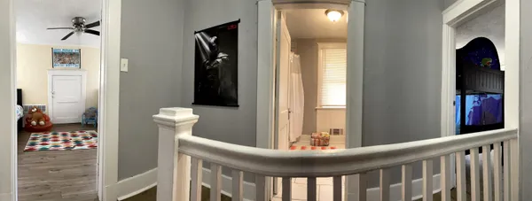 a bedroom with bed and window