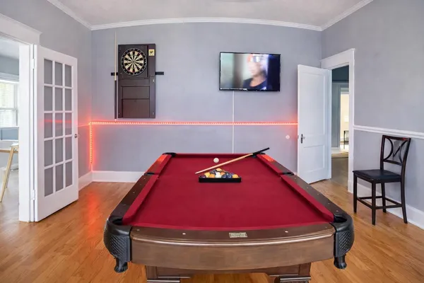a room with furniture and wooden floor
