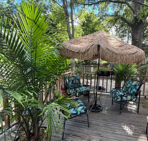 a view of outdoor space with deck and patio