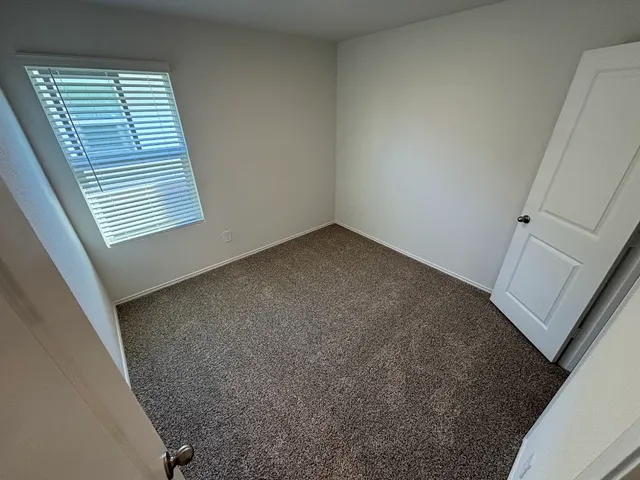 an empty room with a window