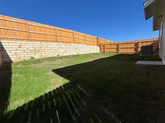 a view of an outdoor space and a swimming pool