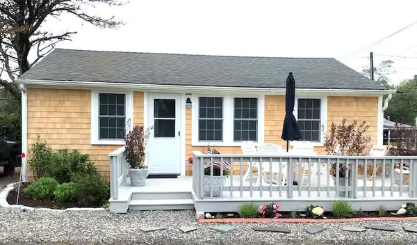 a front view of a house with glass windows