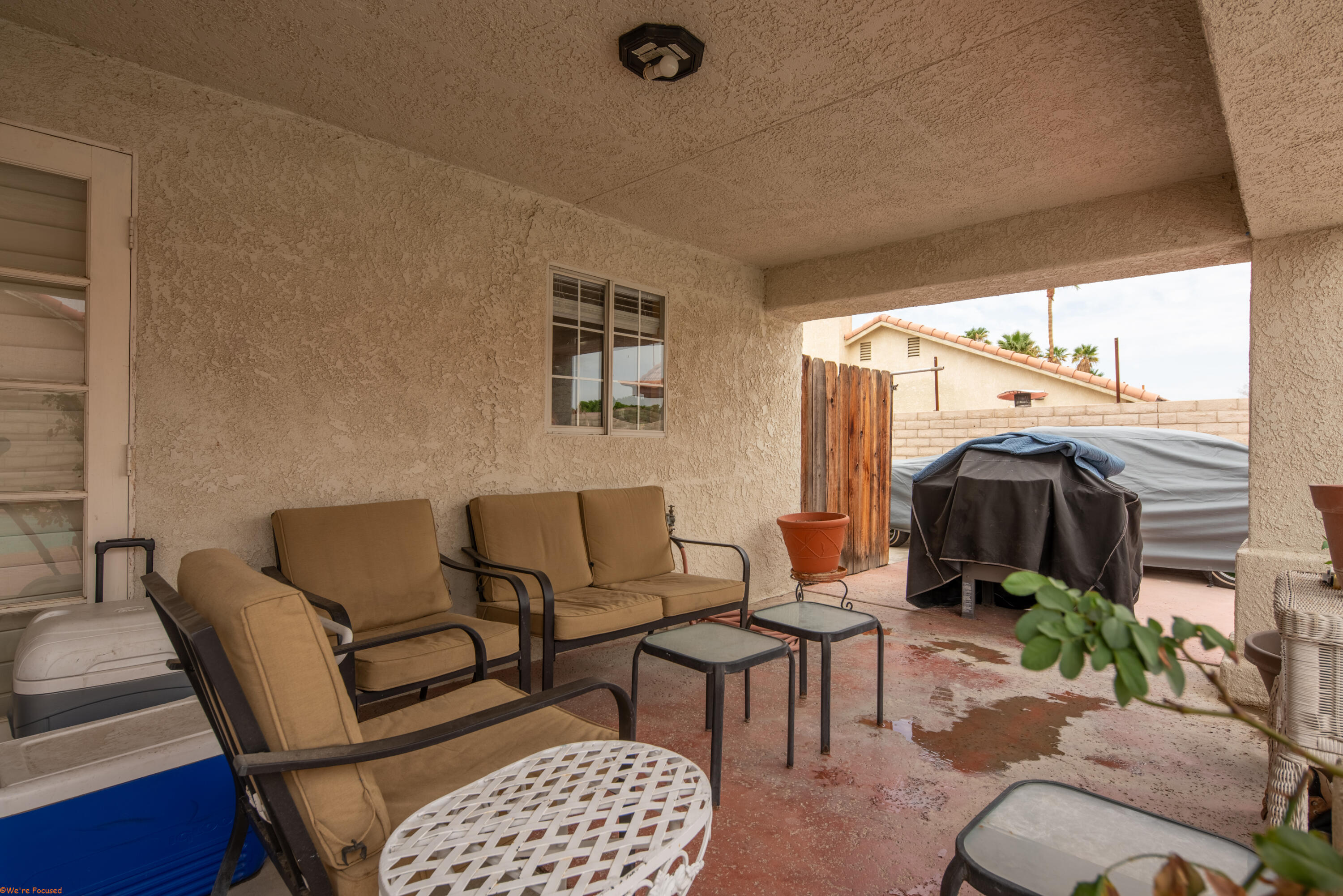 80928 Brown Street Indio, CA 92201 - Photo 27 of 35 a living room with furniture and a rug