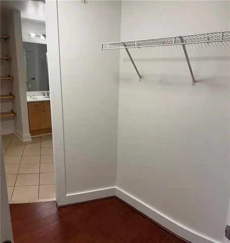 a bathroom with a sink a toilet and a shower