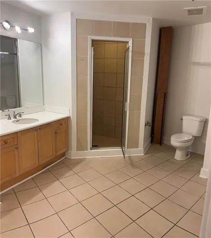 a bathroom with a sink a mirror and a shower