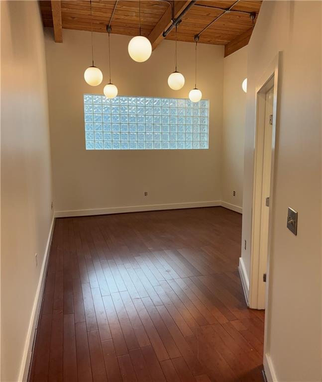 204 Walker Street Southwest, Unit 314 Atlanta, GA 30313 - Photo 27 of 42 a view of a livingroom with wooden floor