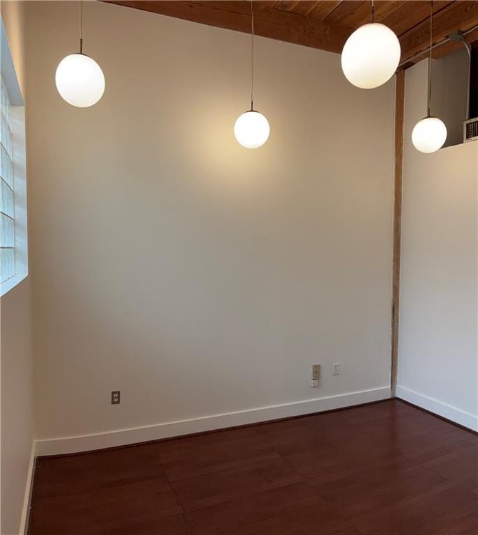 204 Walker Street Southwest, Unit 314 Atlanta, GA 30313 - Photo 29 of 42 a view of a room with a fan and window