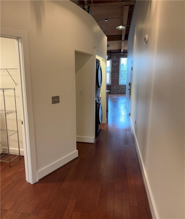 204 Walker Street Southwest, Unit 314 Atlanta, GA 30313 - Photo 34 of 42 a view of a hallway with wooden floor