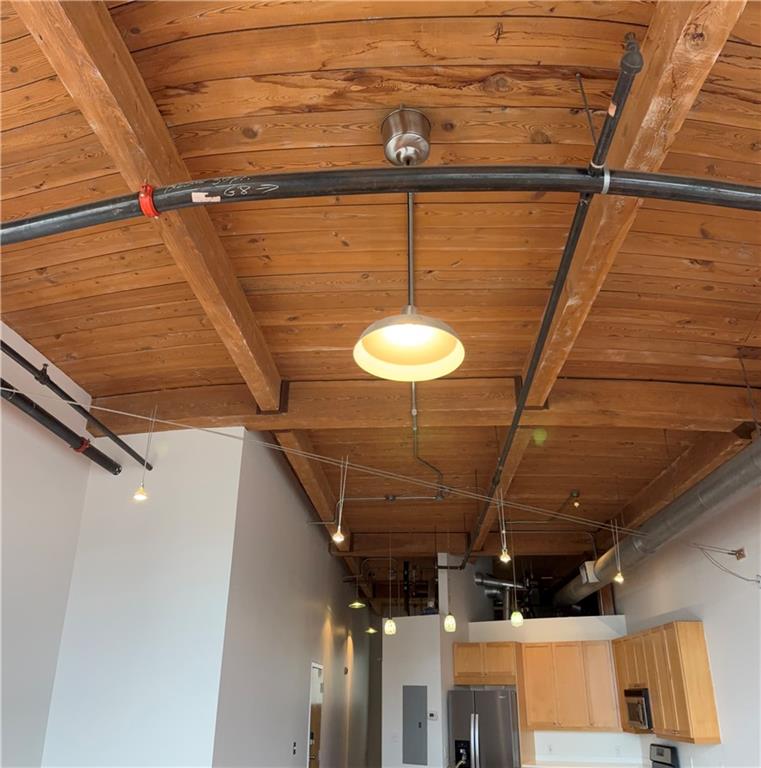 204 Walker Street Southwest, Unit 314 Atlanta, GA 30313 - Photo 37 of 42 a view of a room with racks on the wall