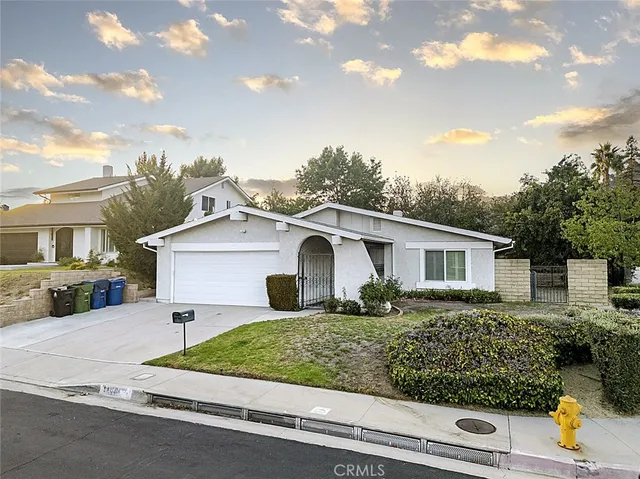 a house view with a outdoor space