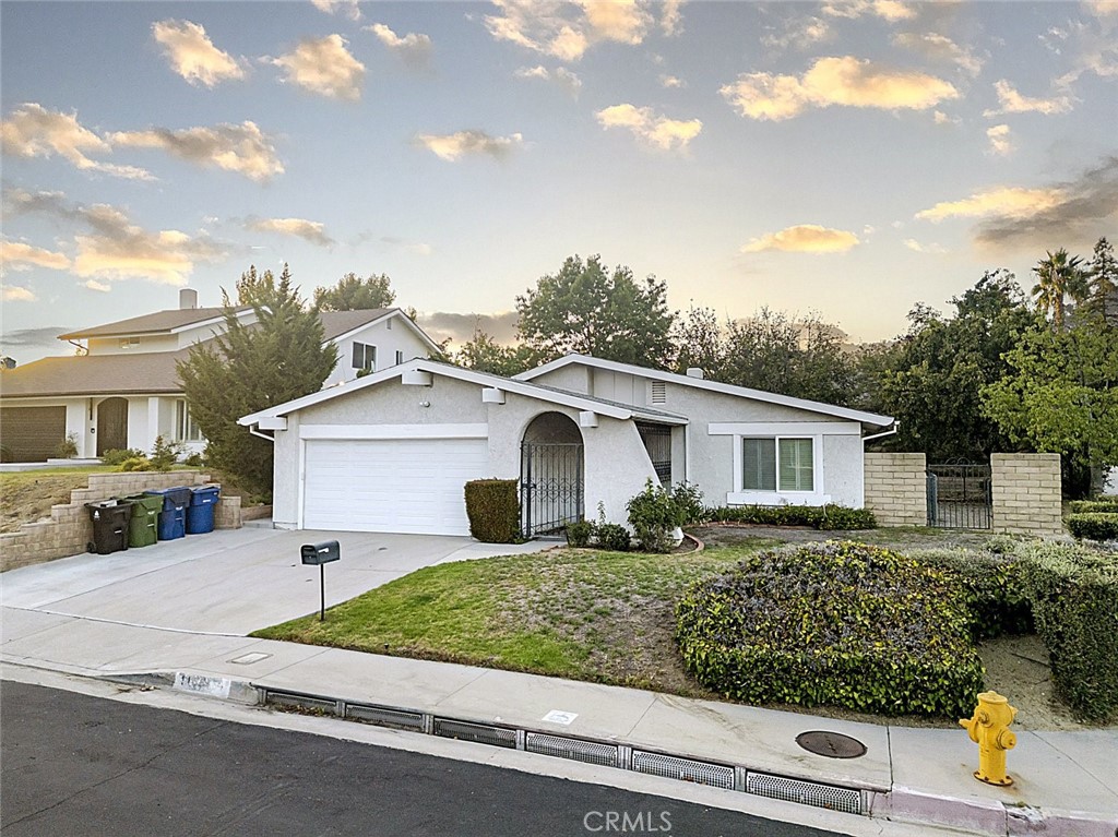 a house view with a outdoor space