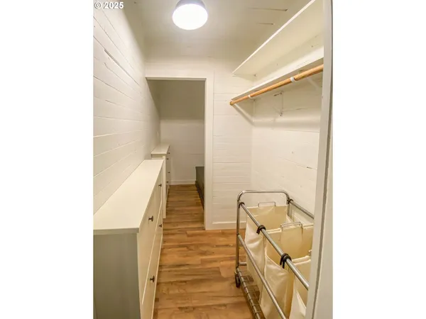 a view of a hallway with staircase