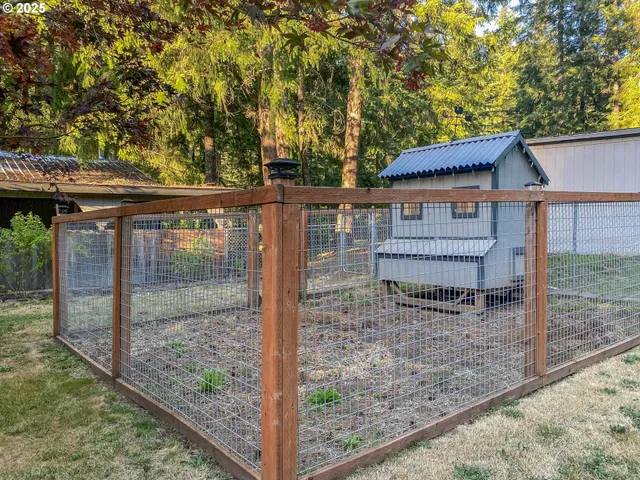 a backyard of a house with lots of green space