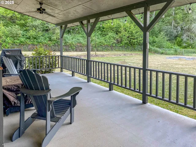 a view of a two chairs in the roof deck