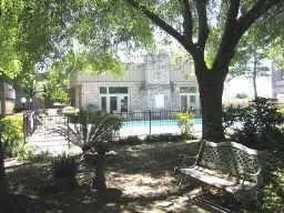 a view of a house with backyard from a patio