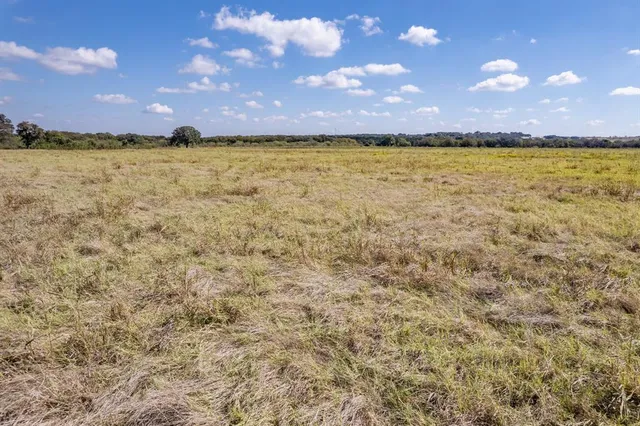 a view of an ocean & building