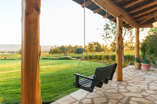 a view of a patio with garden