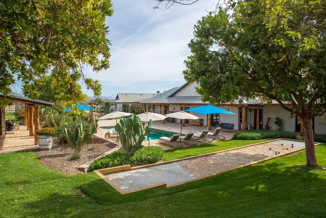 a view of outdoor space yard deck patio and fire pit