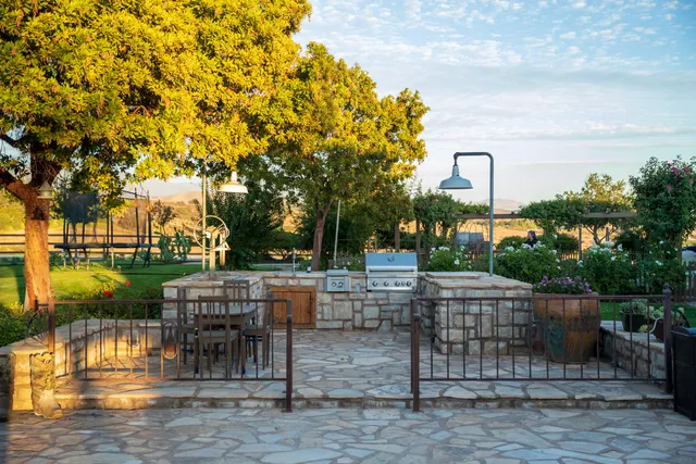 a garden view with a sitting space