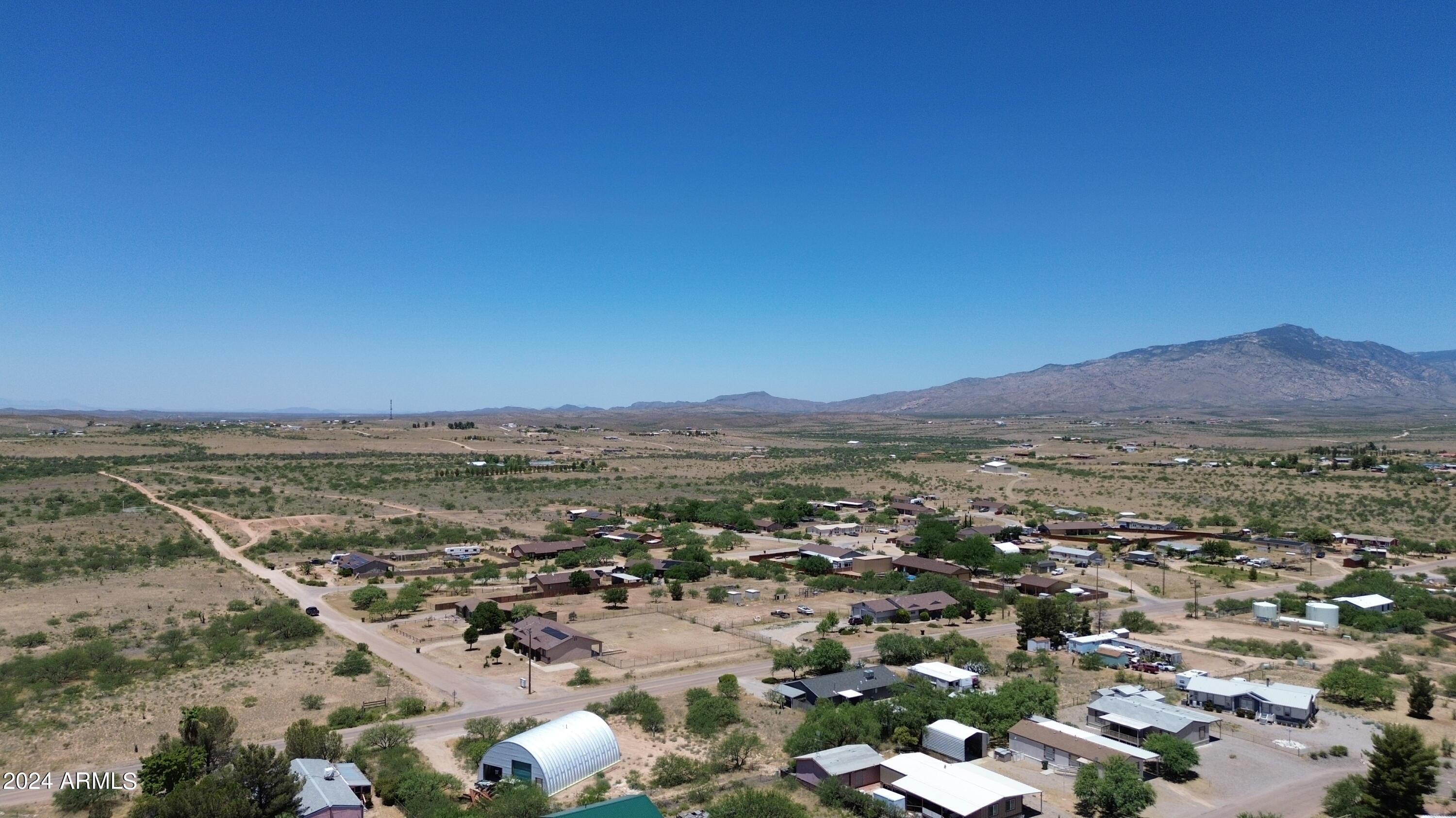 Lot 363 North Mescal Road, Unit 363 Benson, AZ 85602 - Photo 16 of 31 an aerial view of residential houses with outdoor space