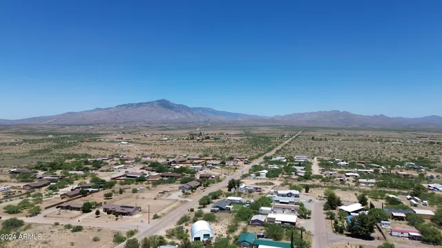 an aerial view of residential house and green space