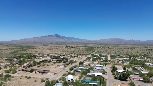 an aerial view of residential house and green space