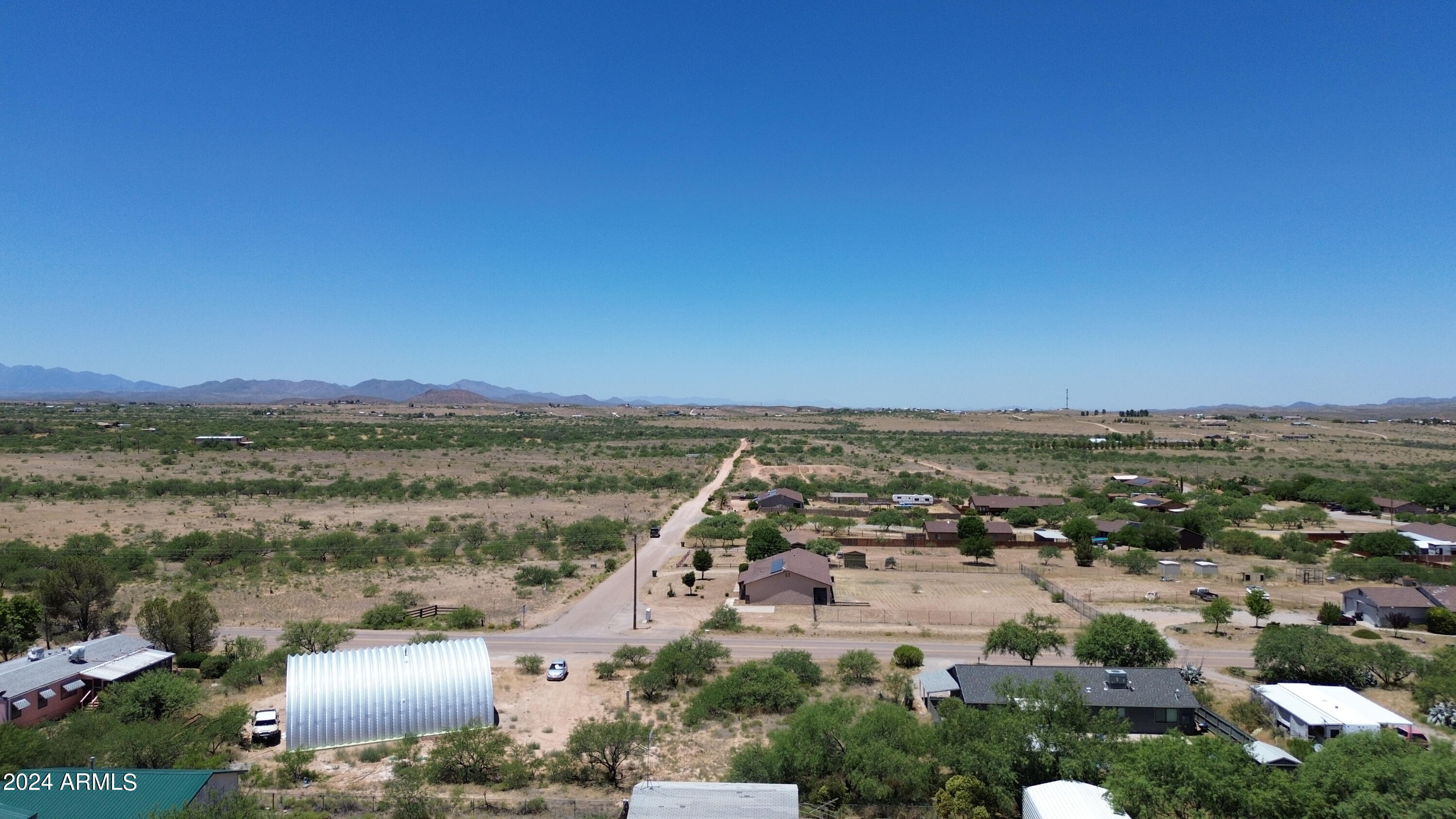 Lot 363 North Mescal Road, Unit 363 Benson, AZ 85602 - Photo 25 of 31 an aerial view of residential building and lake view
