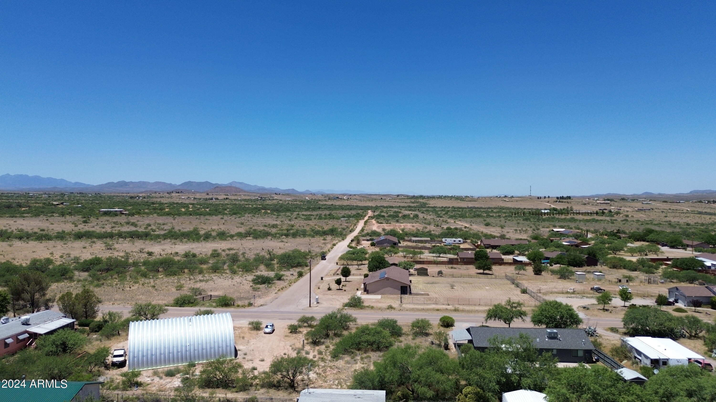 Lot 363 North Mescal Road, Unit 363 Benson, AZ 85602 - Photo 26 of 31 an aerial view of residential building and lake view