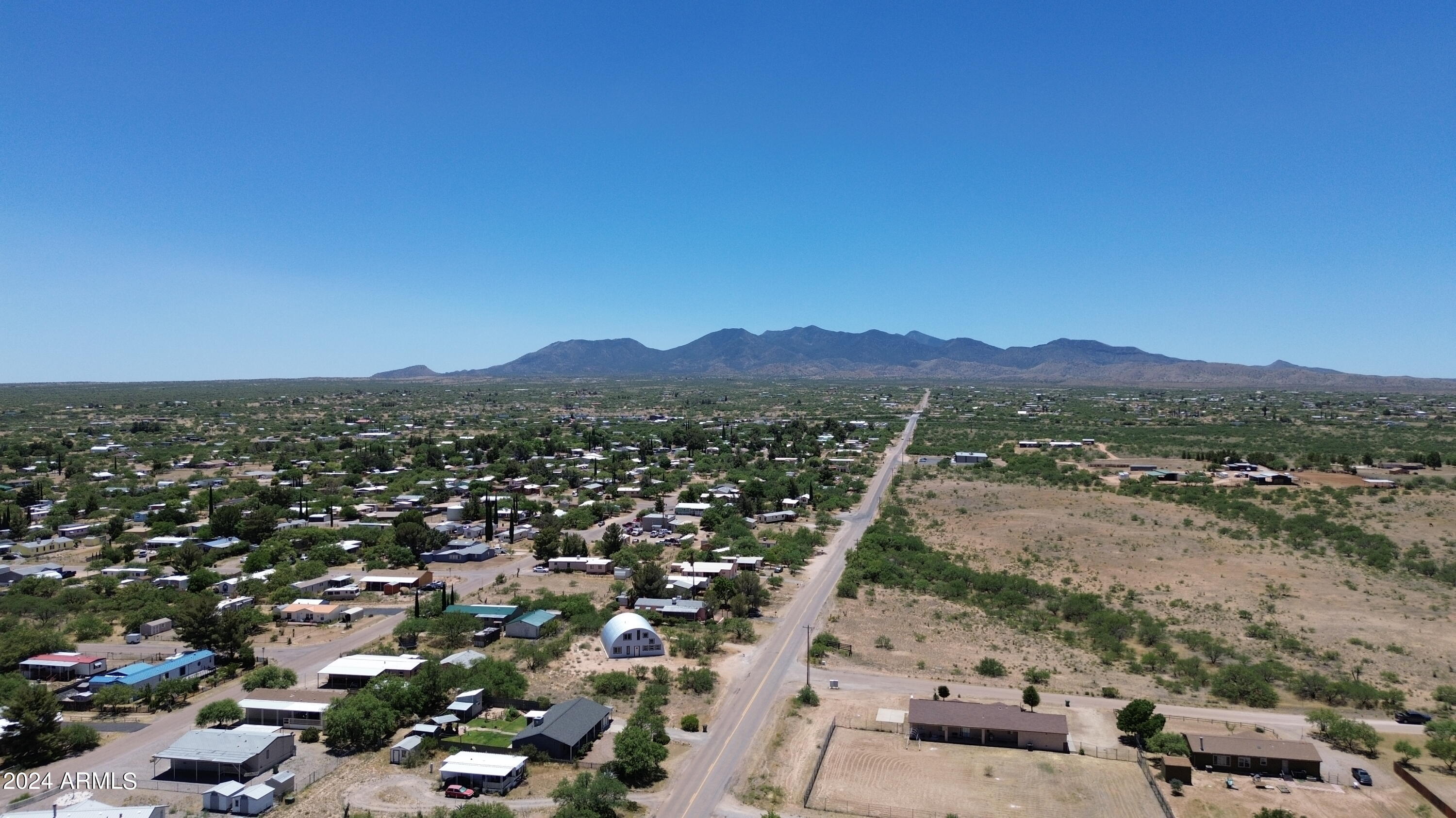Lot 363 North Mescal Road, Unit 363 Benson, AZ 85602 - Photo 28 of 31 an aerial view of residential house and green space