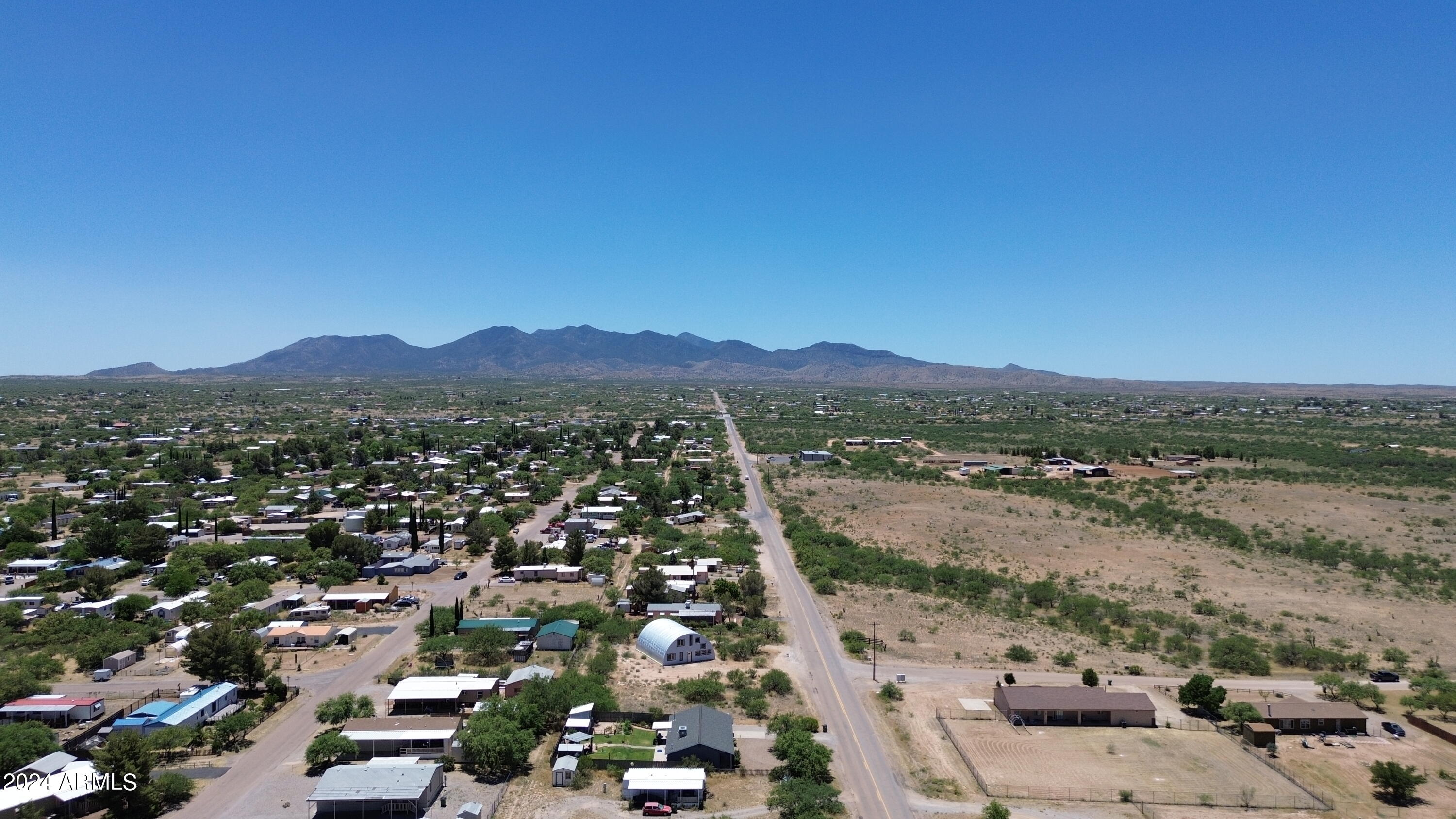 Lot 363 North Mescal Road, Unit 363 Benson, AZ 85602 - Photo 31 of 31 an aerial view of residential house and green space