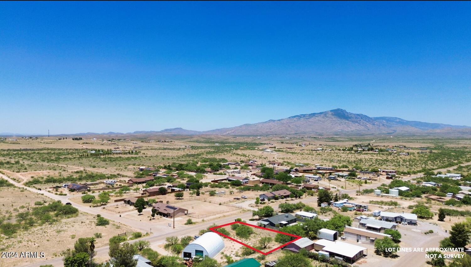 Lot 363 North Mescal Road, Unit 363 Benson, AZ 85602 - Photo 10 of 31 a view of a city with mountains in the background