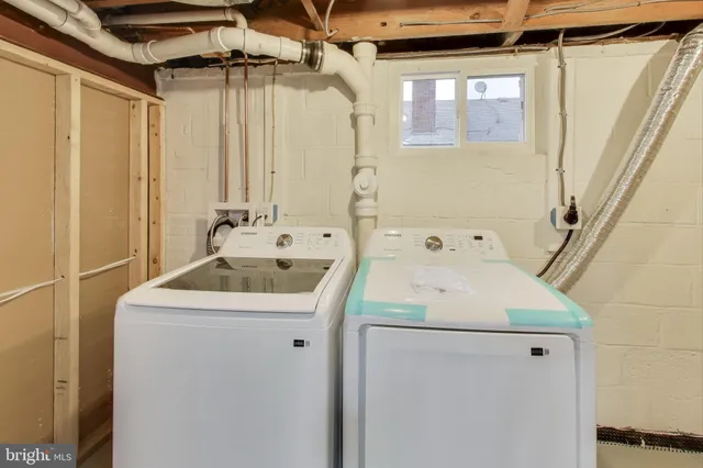 a utility room with dryer and washer