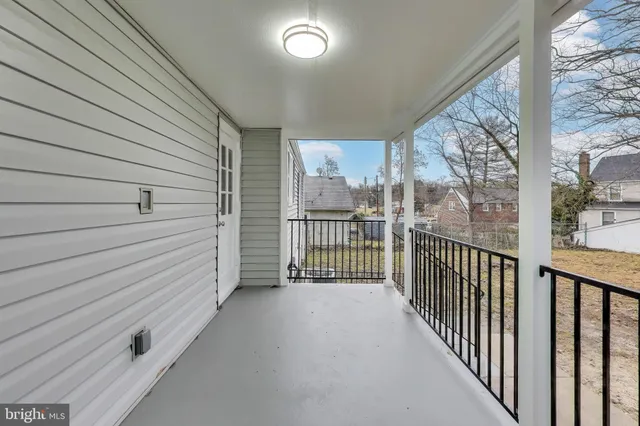 a view of a porch with a door