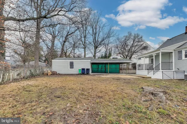 a view of a house with a snow in the yard
