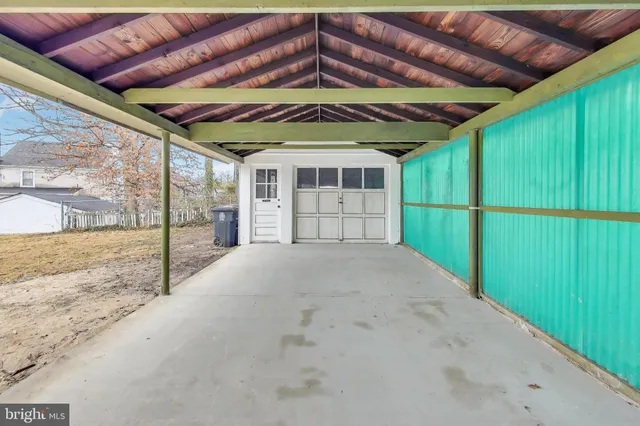 a view of a room with a large window