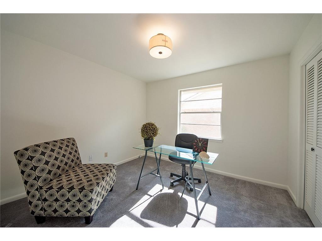 8717 Hackney Lane Dallas, TX 75238 - Photo 19 of 21 Office featuring baseboards and dark colored carpet