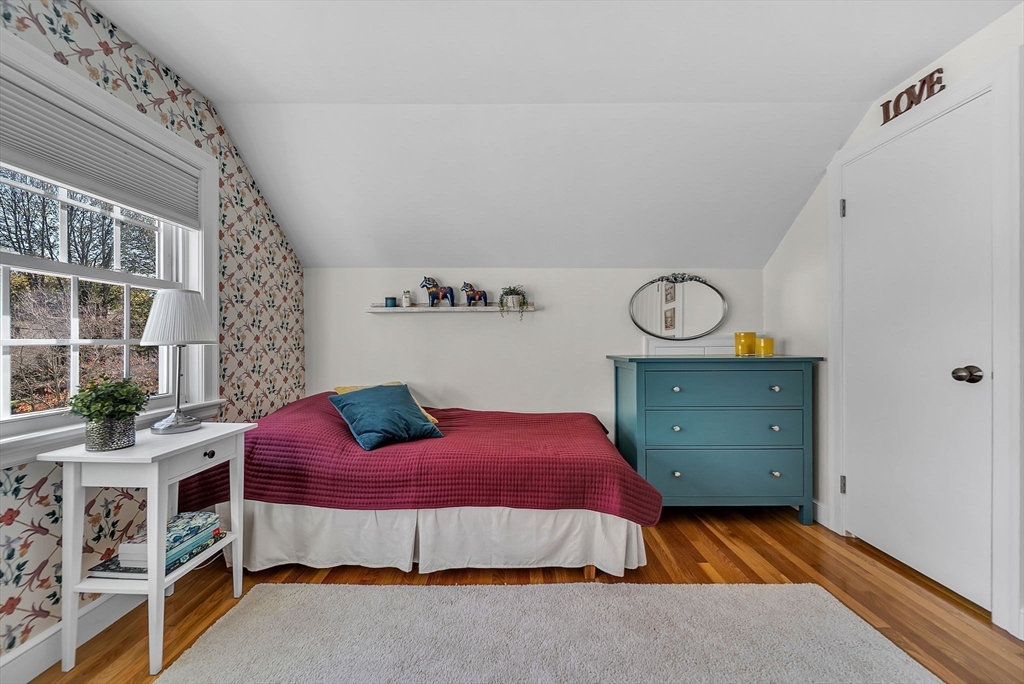 14 Twitchell Street Wellesley, MA 02482 - Photo 18 of 37 a bedroom with a bed and dresser