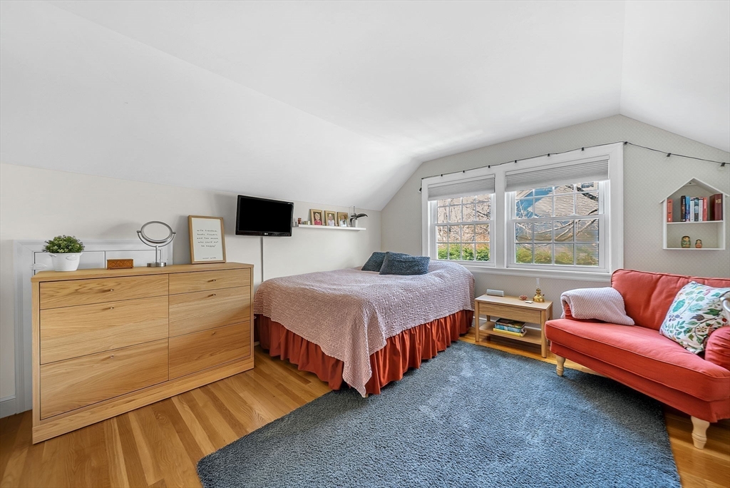 14 Twitchell Street Wellesley, MA 02482 - Photo 20 of 37 a living room with furniture and a flat screen tv